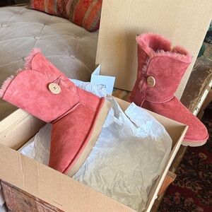 UGG boots. Color of the Southwest rust. Worn a handful of times. Like brand new.